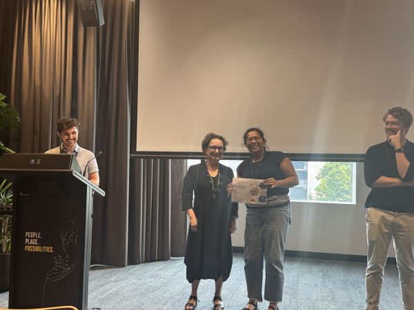 The Dean of Science presenting a speaker with a certificate