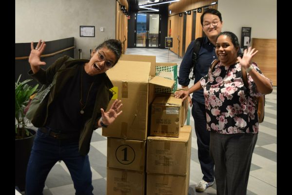 SECAN summit organisers posing with boxes