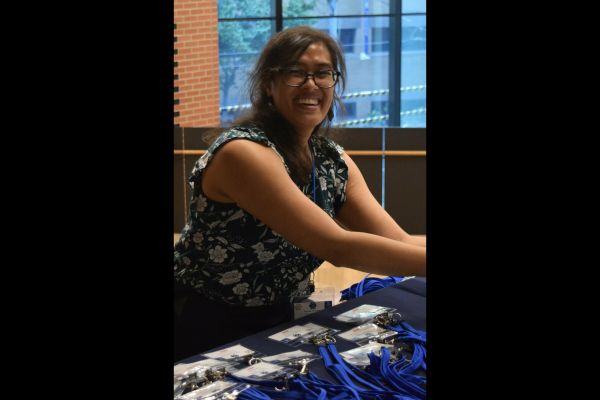 A SECAN member staffing the registration desk