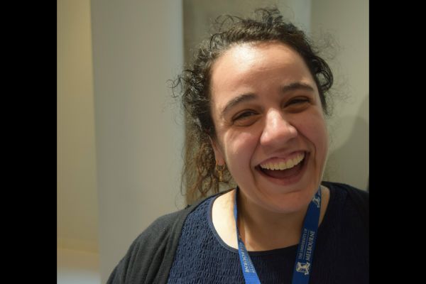 A close-up of a conference attendee