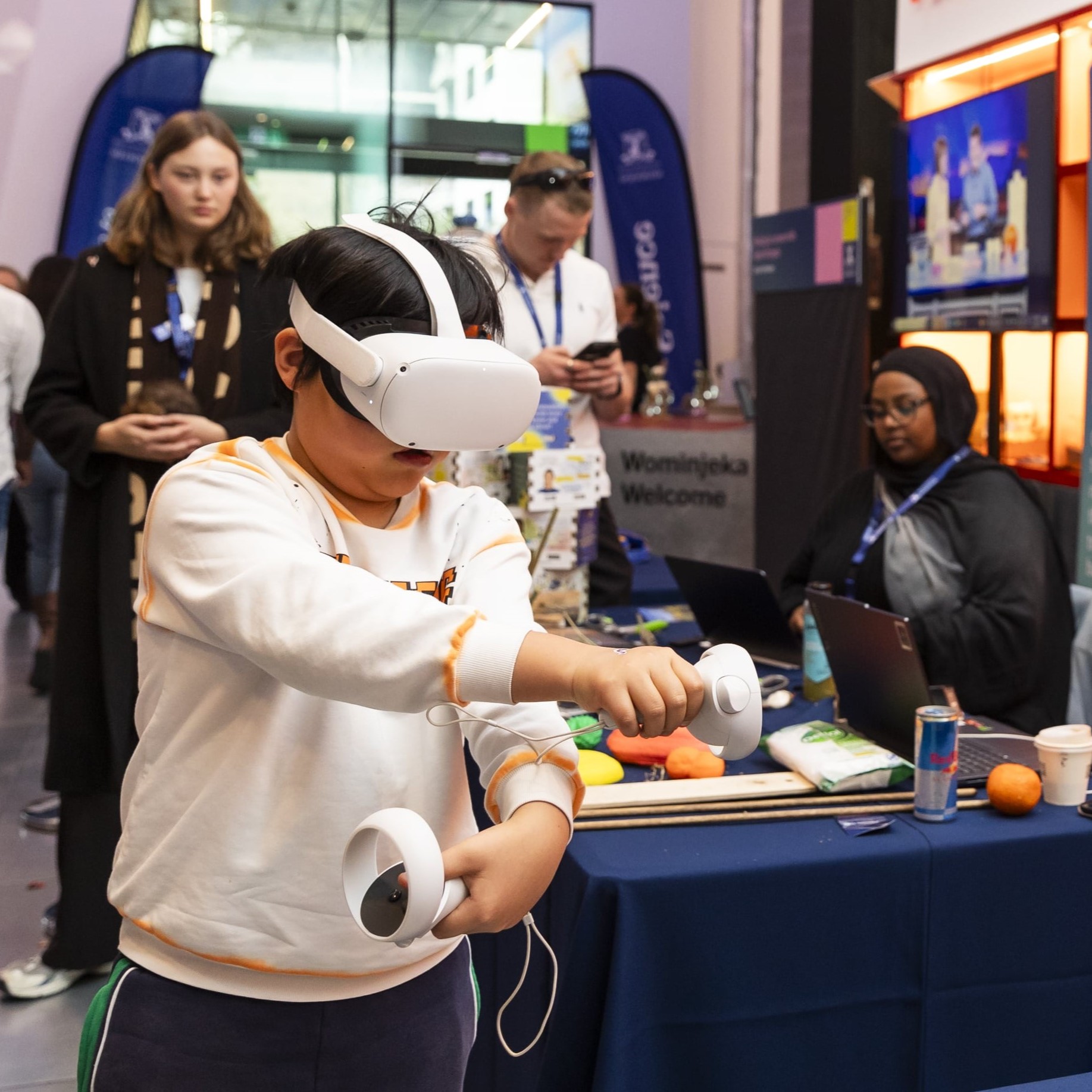 Child wearing a virtual reality face screen