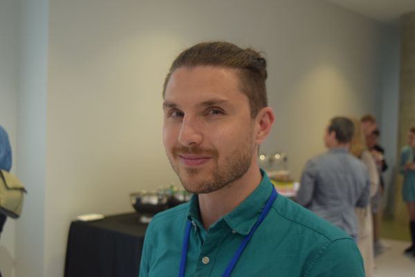 A close-up of a conference organiser in the break area