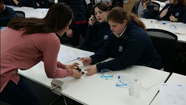 students working on a table