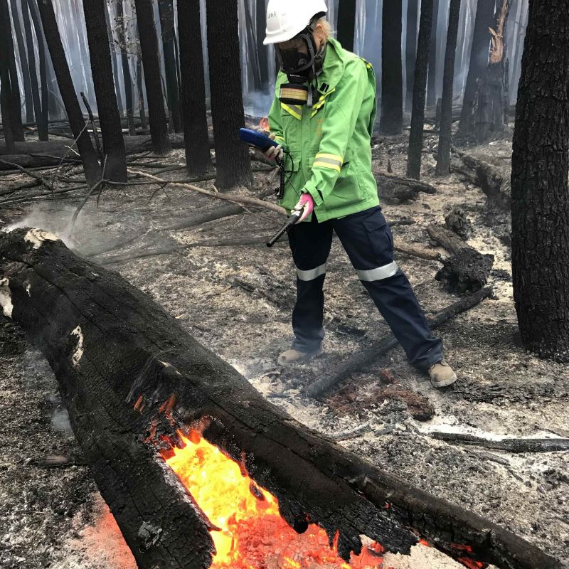Smouldering wood debris