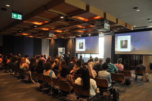 The Dean of Science, Moira O'Bryan, giving the closing address. Most of the audience is in frame