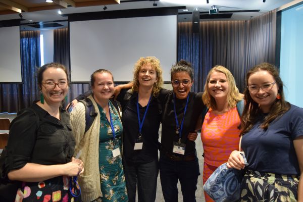 Several conference organisers posing for the camera
