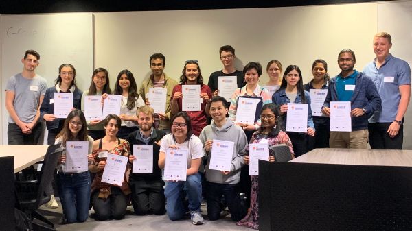 a group of students all with certificates