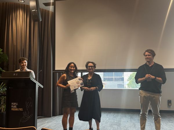 The Dean of Science presenting a speaker with a certificate