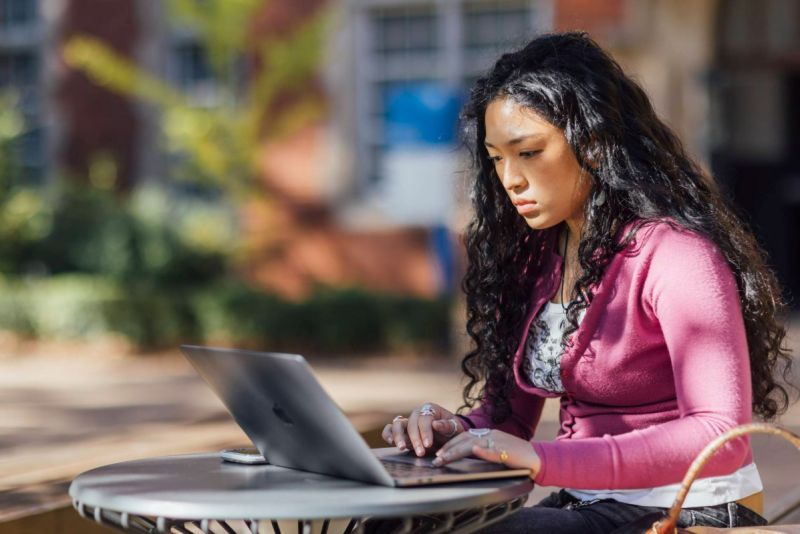 Student studying on laptop